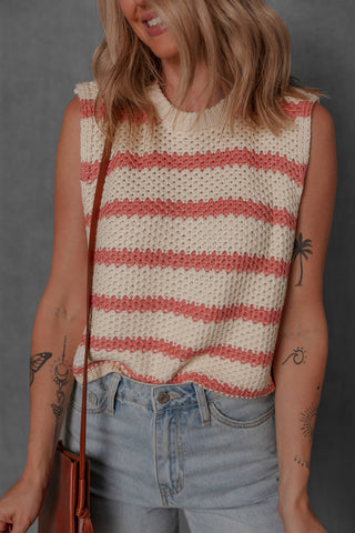 women modeling a cream and blush stripe sleeveless sweater style top