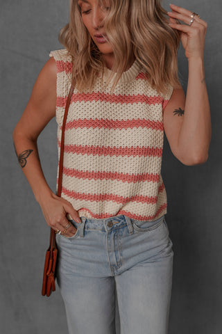 women modeling a cream and blush stripe sleeveless sweater style top