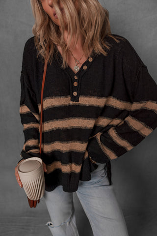 women modeling a black and tan stripe henley sweater