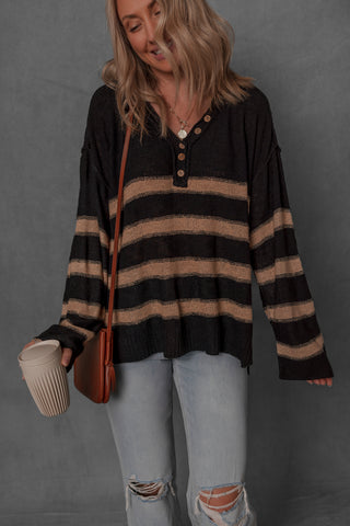 women modeling a black and tan stripe henley sweater