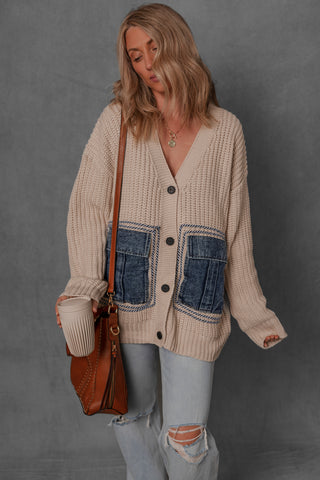 women modeling a knit sweater with denim pockets