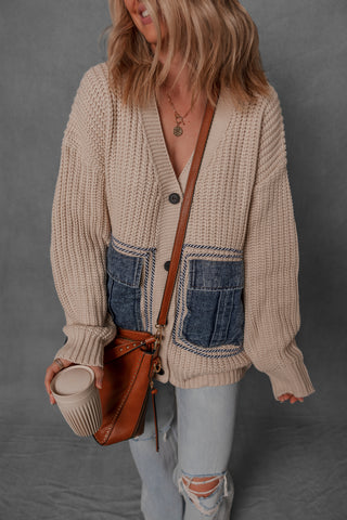 women modeling a knit sweater with denim pockets