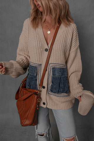 women modeling a knit sweater with denim pockets